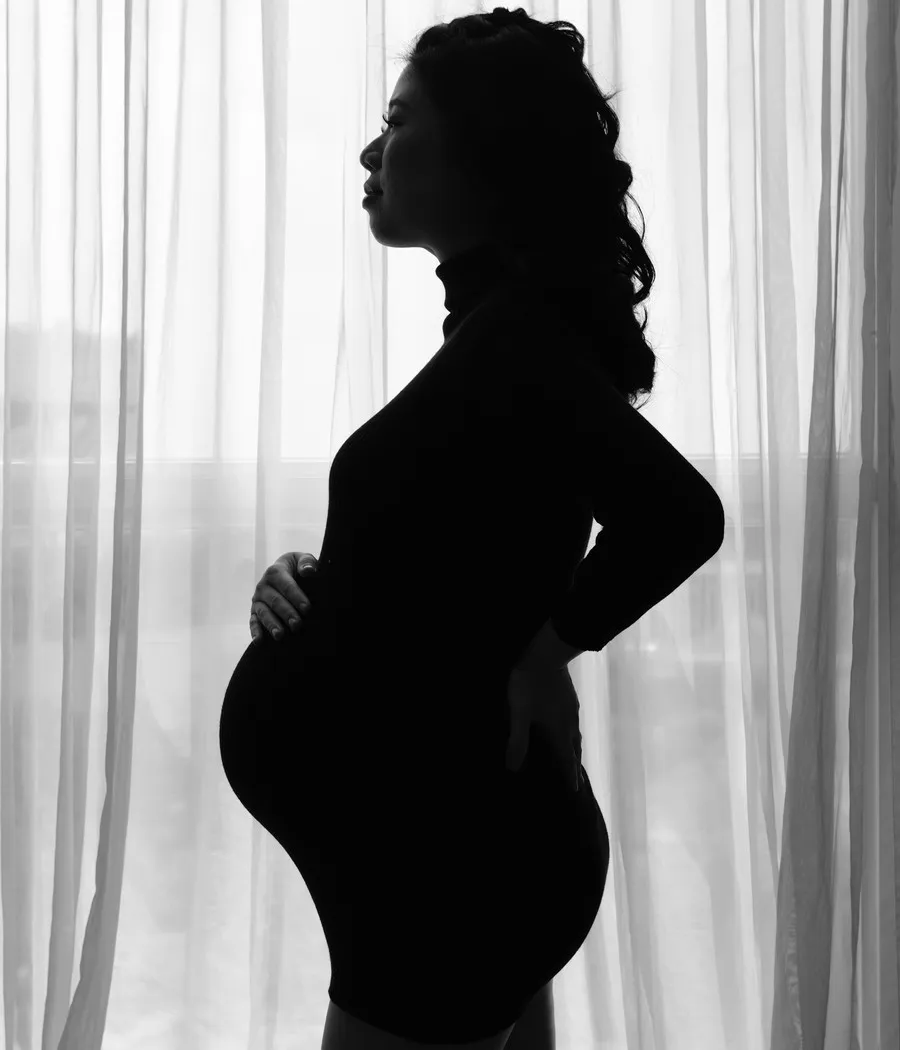 A pregnant worker on the job, representing rights under the Pregnant Workers Fairness Act in Illinois